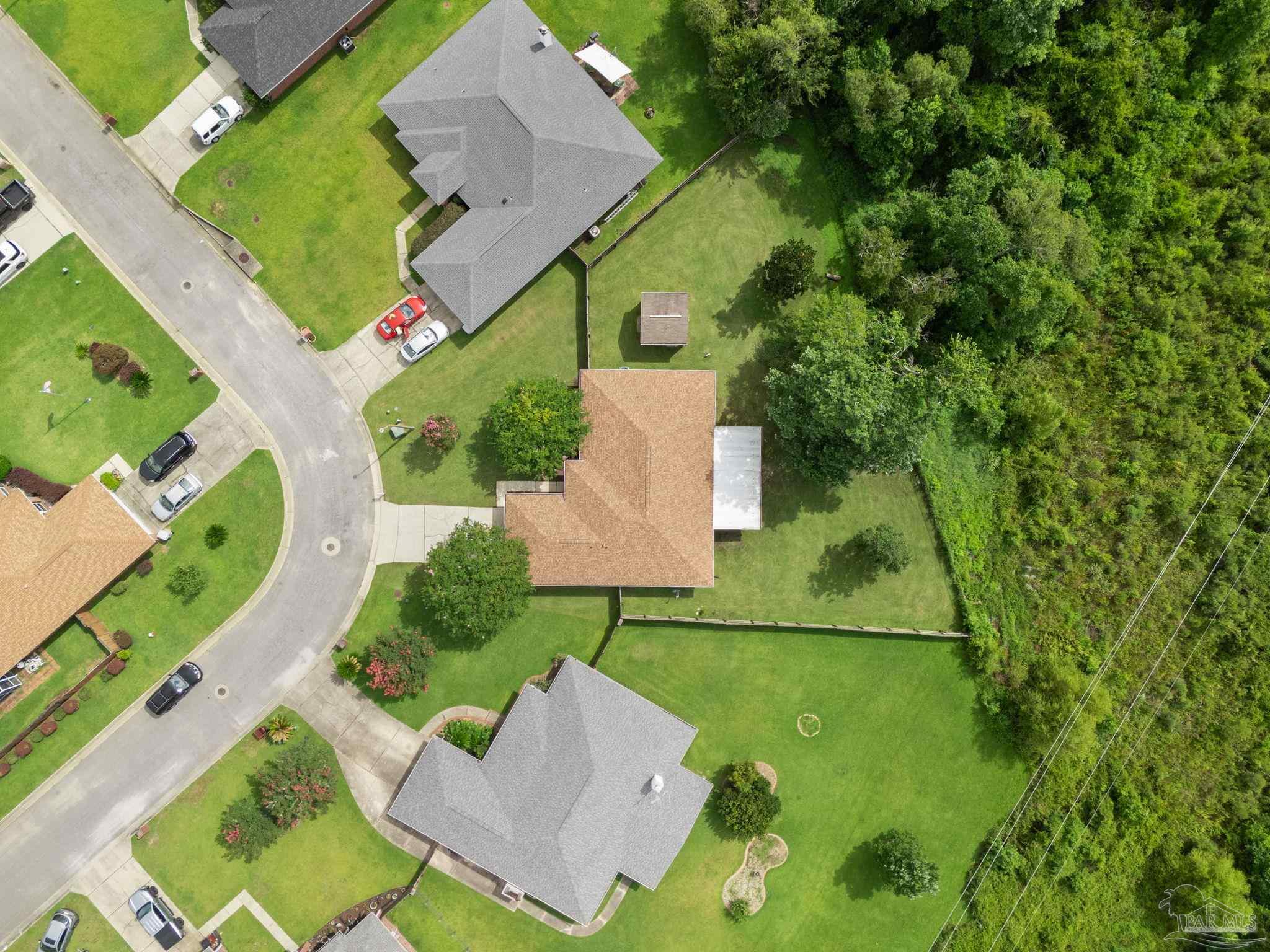 5642 Berrybrook Circle Pace, FL 32571 - Photo 57 of 72 an aerial view of a house with a garden