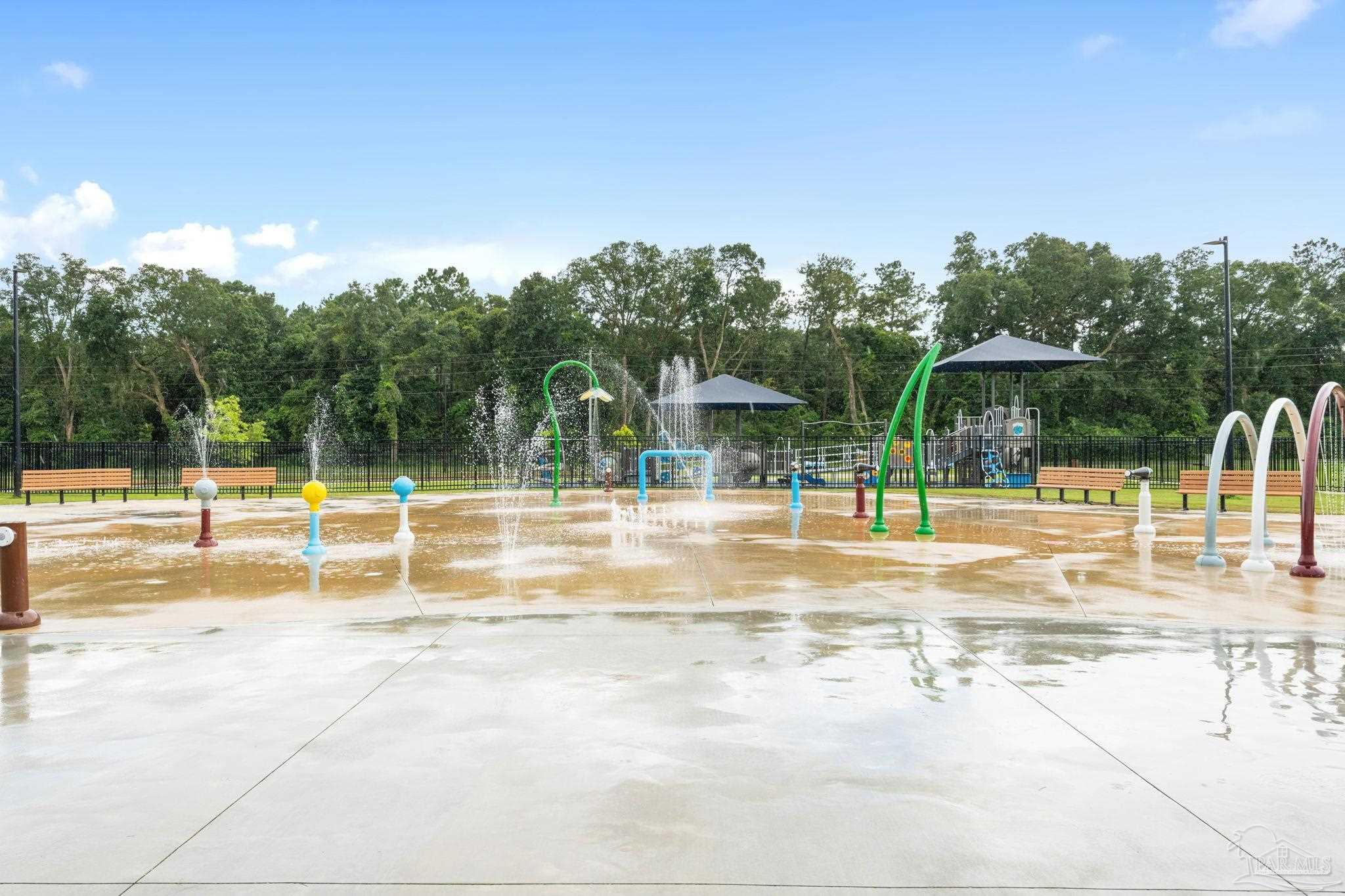 5642 Berrybrook Circle Pace, FL 32571 - Photo 67 of 72 a view of a swimming pool with an outdoor space and seating area