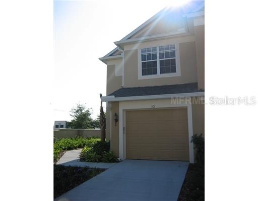 2837 Villafuerte Point, Unit 101 Orlando, FL 32835 - Photo 1 of 1 a view of a house with backyard