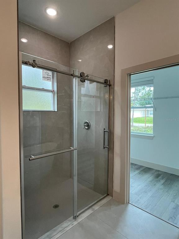 3057 Aliceville Road North Port, FL 34288 - Photo 27 of 33 a bathroom with a shower