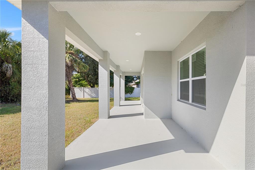 3057 Aliceville Road North Port, FL 34288 - Photo 31 of 33 a view of a hallway with windows