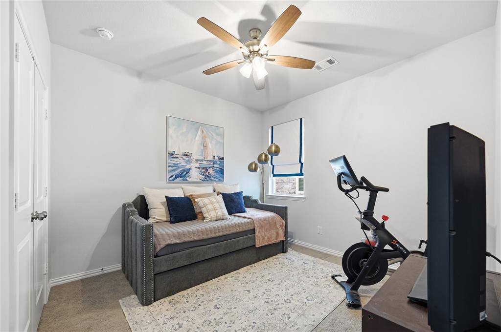 9317 Sunset Lane Oak Point, TX 75068 - Photo 21 of 40 a living room with furniture and a window