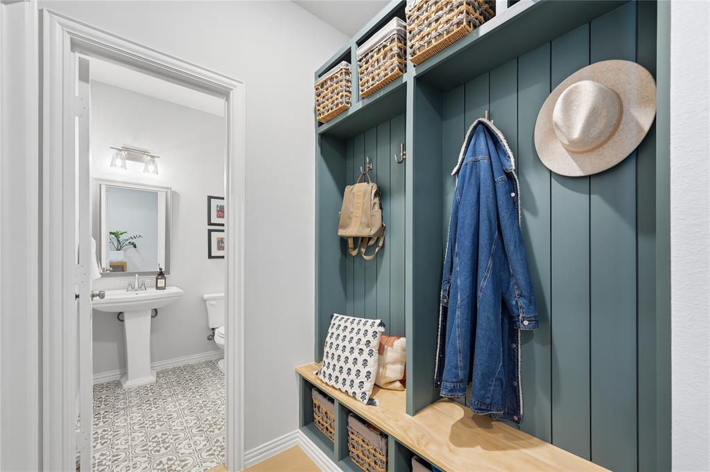 9317 Sunset Lane Oak Point, TX 75068 - Photo 22 of 40 a bathroom with a sink and a mirror