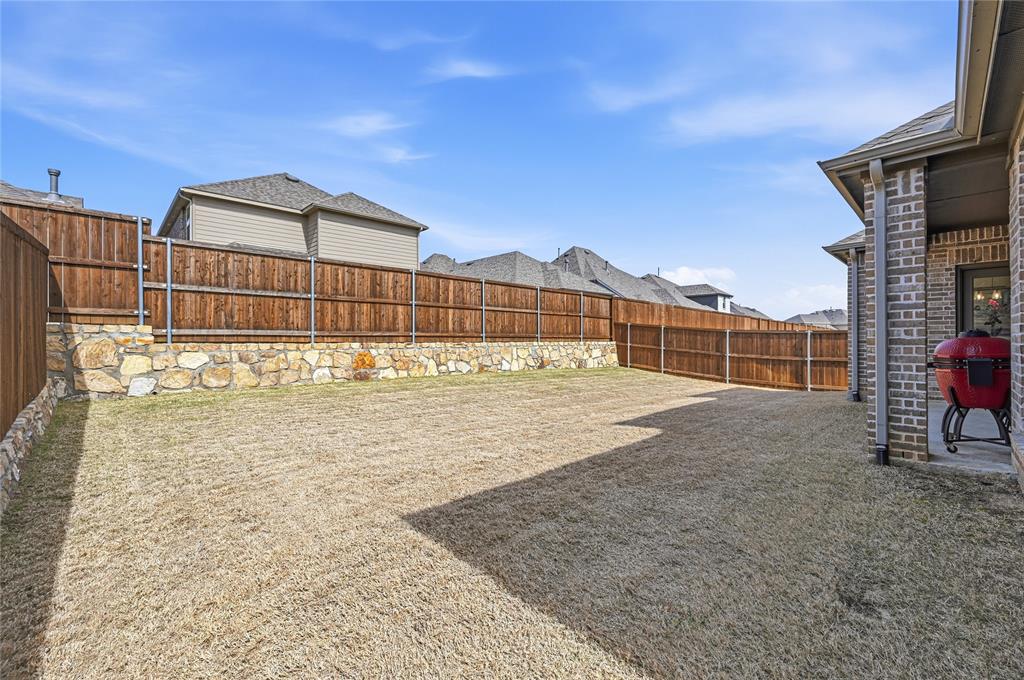 9317 Sunset Lane Oak Point, TX 75068 - Photo 27 of 40 a view of roof with wooden floor and city view