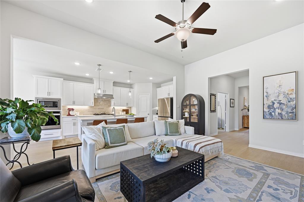 9317 Sunset Lane Oak Point, TX 75068 - Photo 6 of 40 a living room with furniture