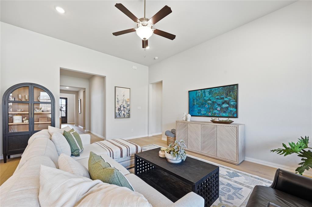 9317 Sunset Lane Oak Point, TX 75068 - Photo 7 of 40 a living room with furniture and a window
