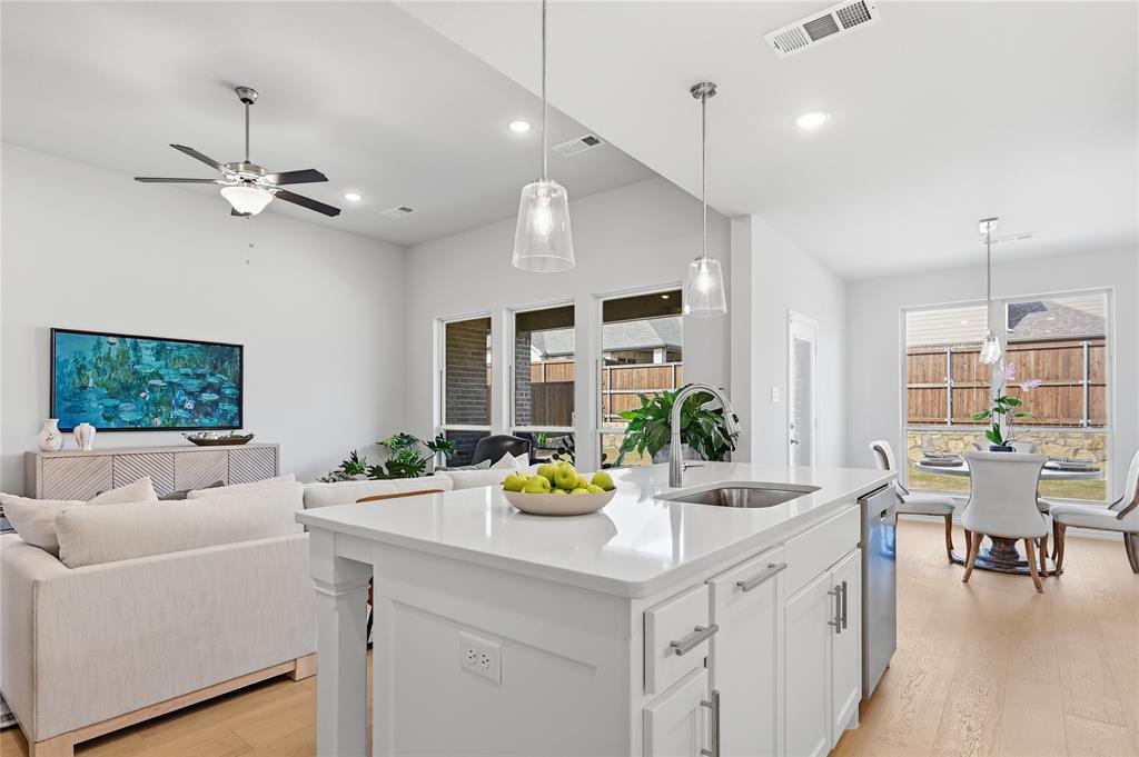 9317 Sunset Lane Oak Point, TX 75068 - Photo 10 of 40 a view of living room with furniture and a flat screen tv