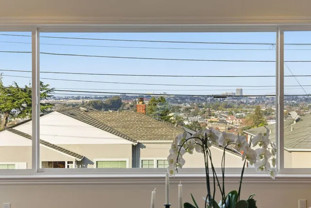 a kitchen with a stove and a refrigerator