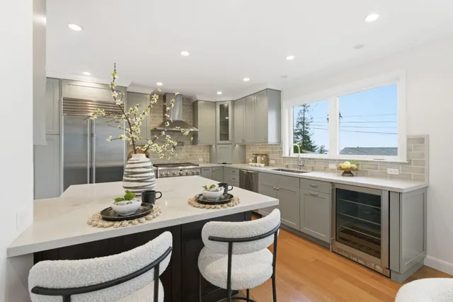 a bathroom with a sink a mirror and shower