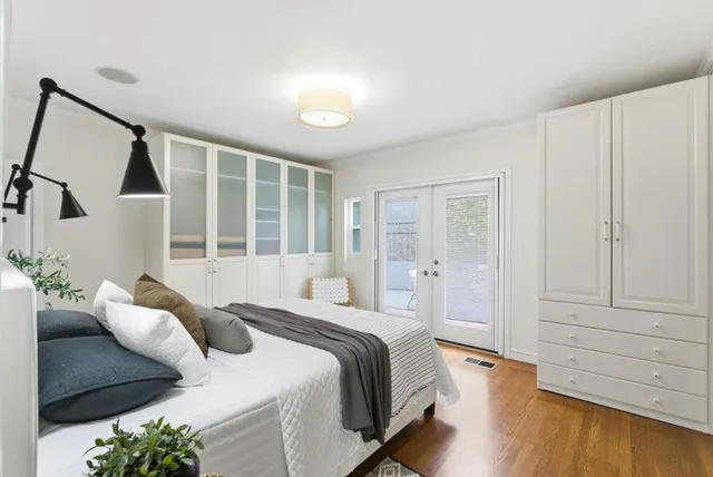 a view of a house with chair and table