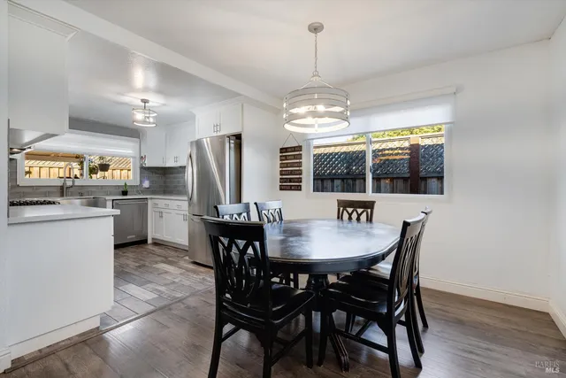 a view of a dining room and chandelier