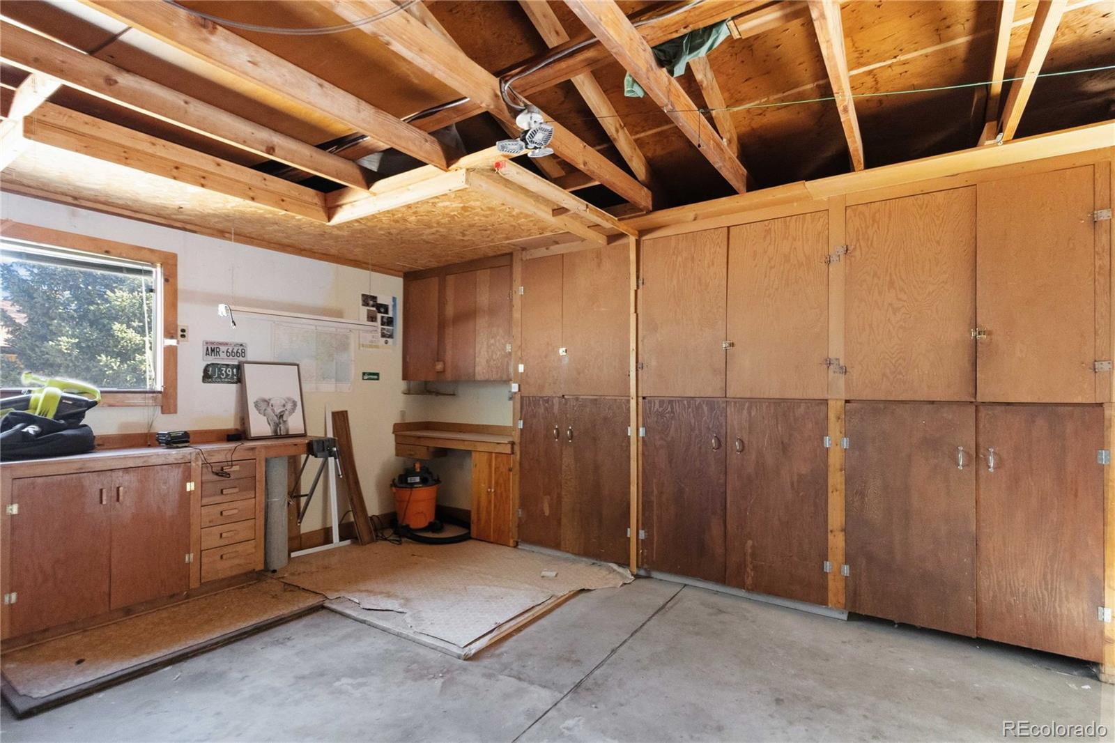 6984 Dover Way Arvada, CO 80004 - Photo 32 of 39 a view of a storage & utility room