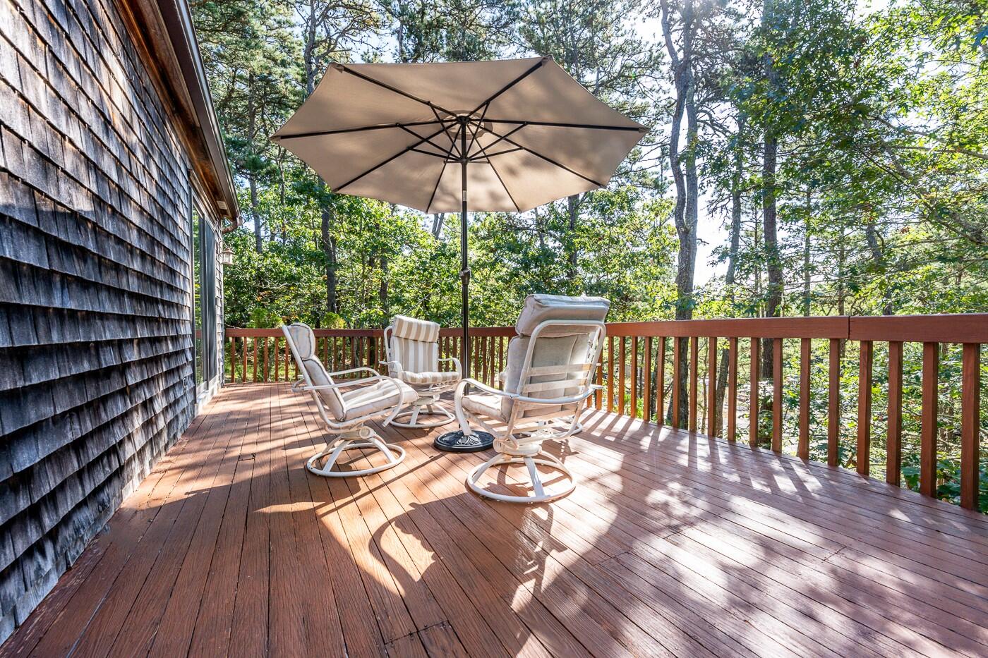 120 Chris Drive Wellfleet, MA 02667 - Photo 23 of 45 a view of balcony with wooden floor and outdoor seating