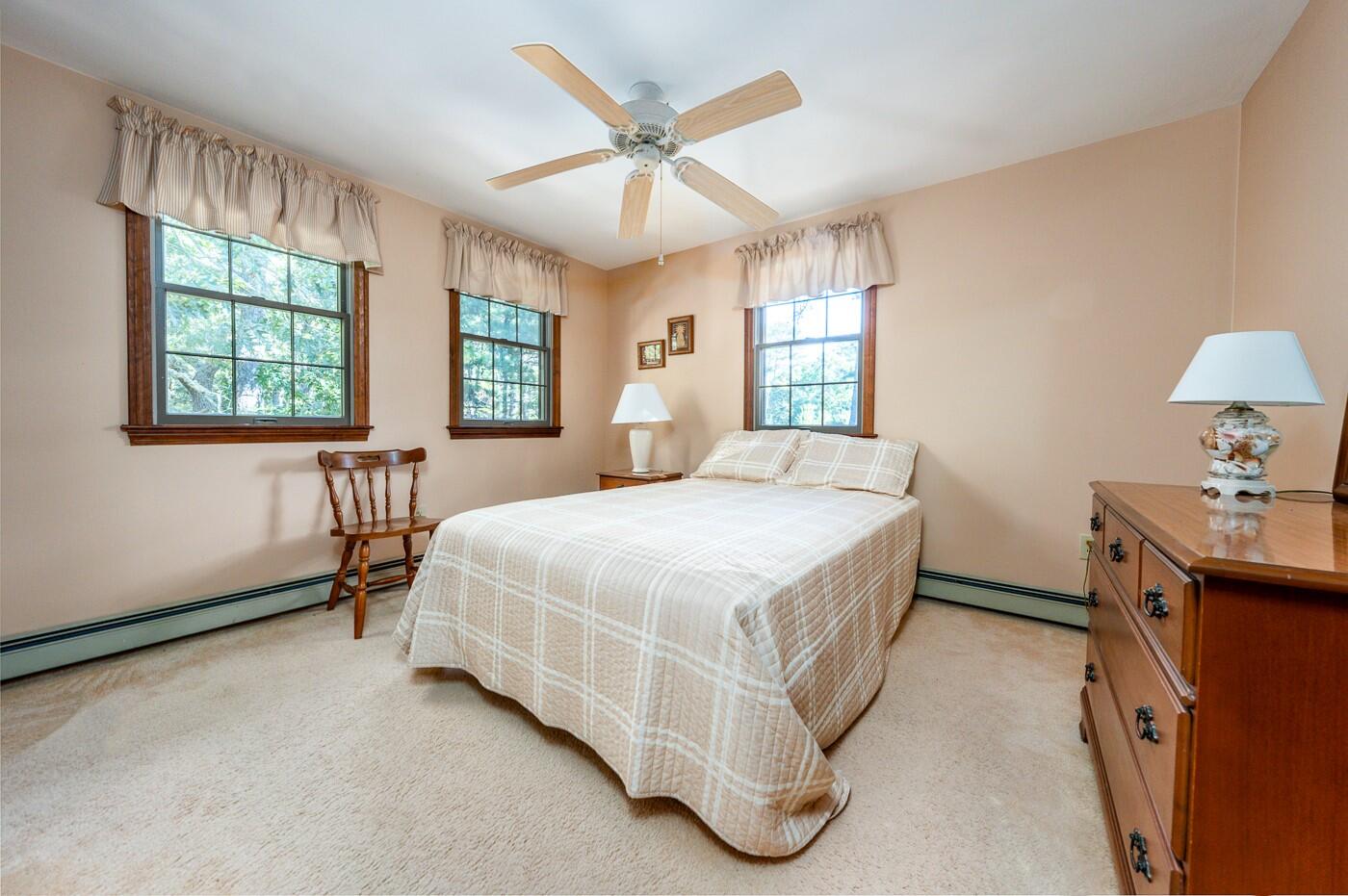 120 Chris Drive Wellfleet, MA 02667 - Photo 35 of 45 a spacious bedroom with a bed and window