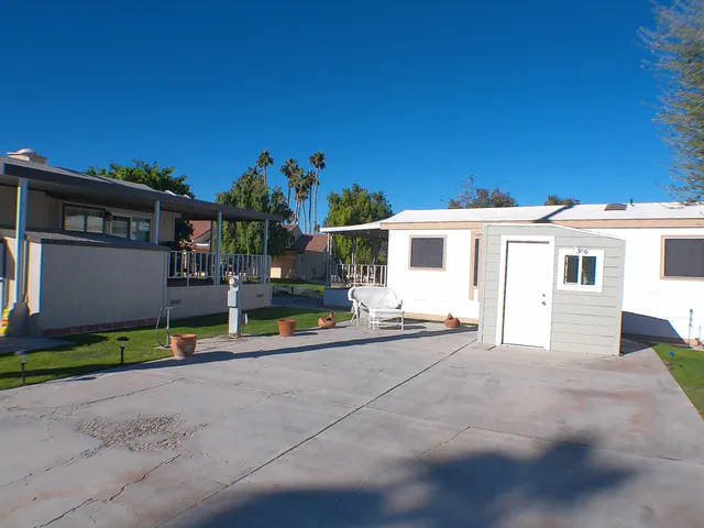 a view of house with outdoor space and porch