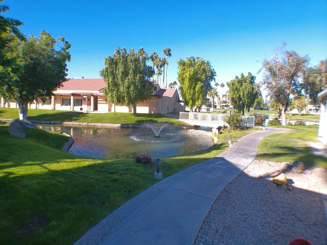 a view of a street with houses on both side