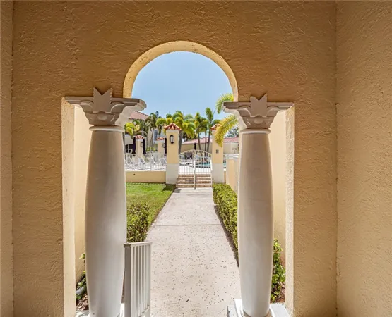 a view of water fountain in front of house