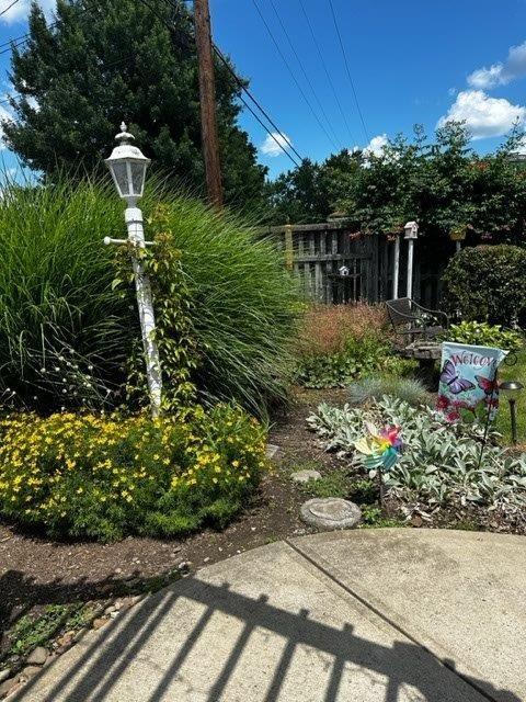 1321 Freeport Road Natrona Heights, PA 15065 - Photo 2 of 43 a front view of a house with a yard