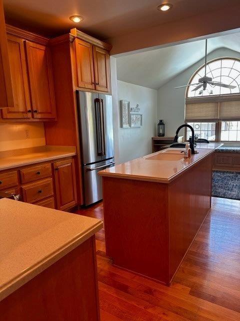 1321 Freeport Road Natrona Heights, PA 15065 - Photo 23 of 43 a kitchen with stainless steel appliances granite countertop a refrigerator a stove and a sink with wooden cabinets