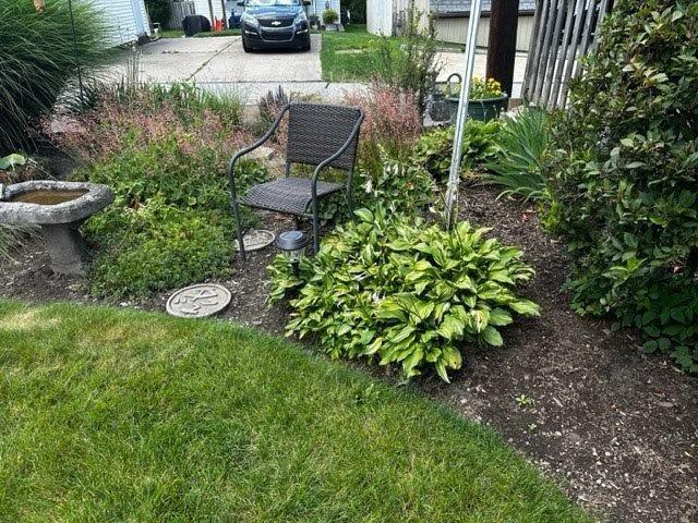 1321 Freeport Road Natrona Heights, PA 15065 - Photo 3 of 43 a view of a backyard with table and chairs plants and large trees