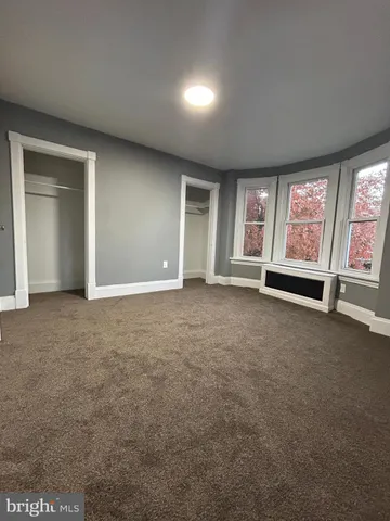 a view of a hallway with staircase