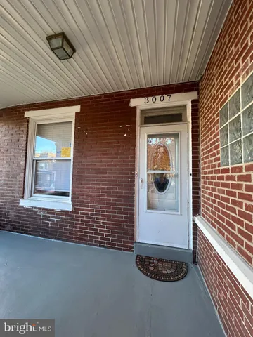a front view of a house with a hallway