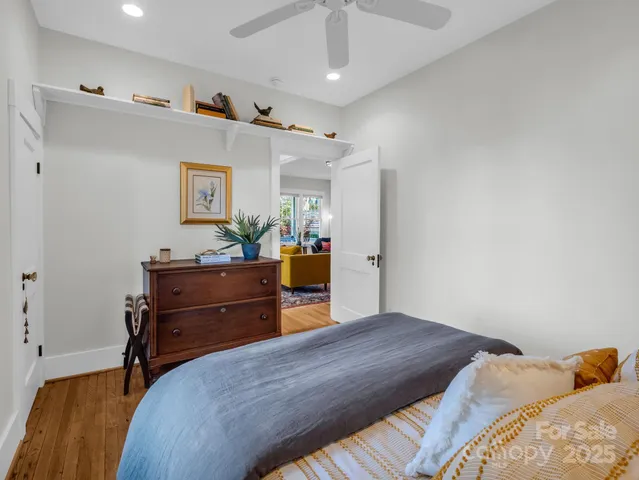 a bathroom with a sink mirror and window