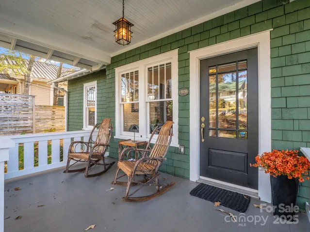 a view of balcony with wooden floor