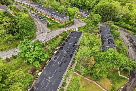 an aerial view of residential house with outdoor space