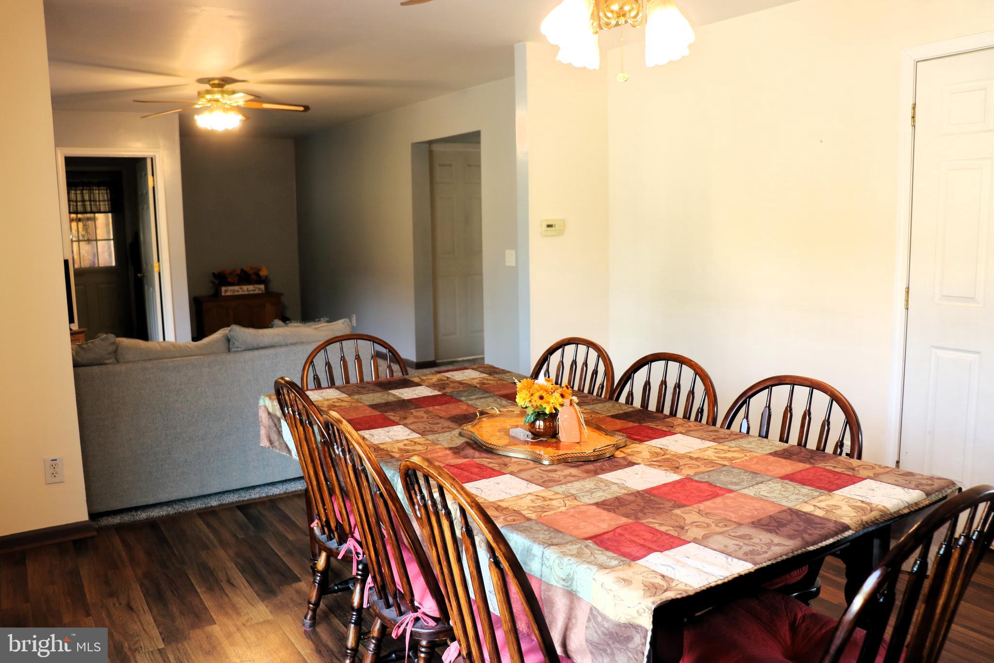 16 Kinkle Road Bridgeton, NJ 08302 - Photo 18 of 31 a dining room with furniture and wooden floor