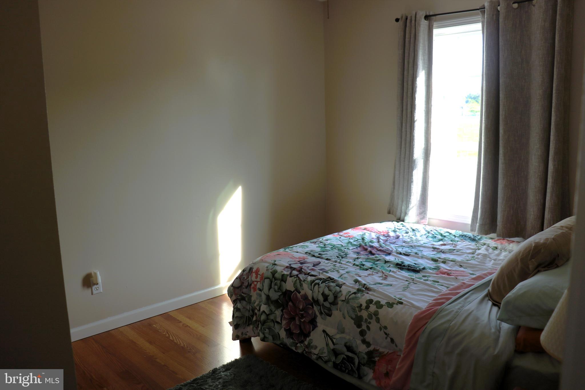 16 Kinkle Road Bridgeton, NJ 08302 - Photo 24 of 31 a bedroom with a bed and a window