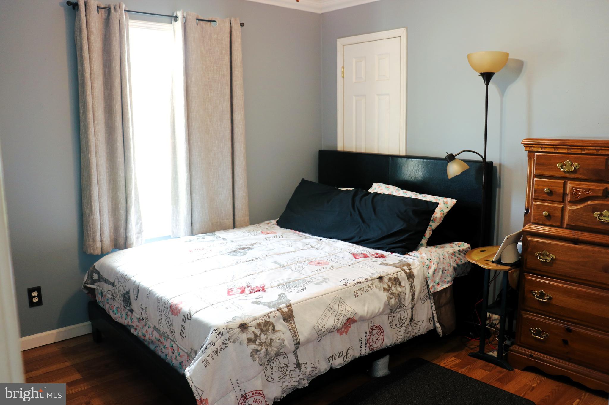 16 Kinkle Road Bridgeton, NJ 08302 - Photo 25 of 31 a bedroom with a bed and a closet