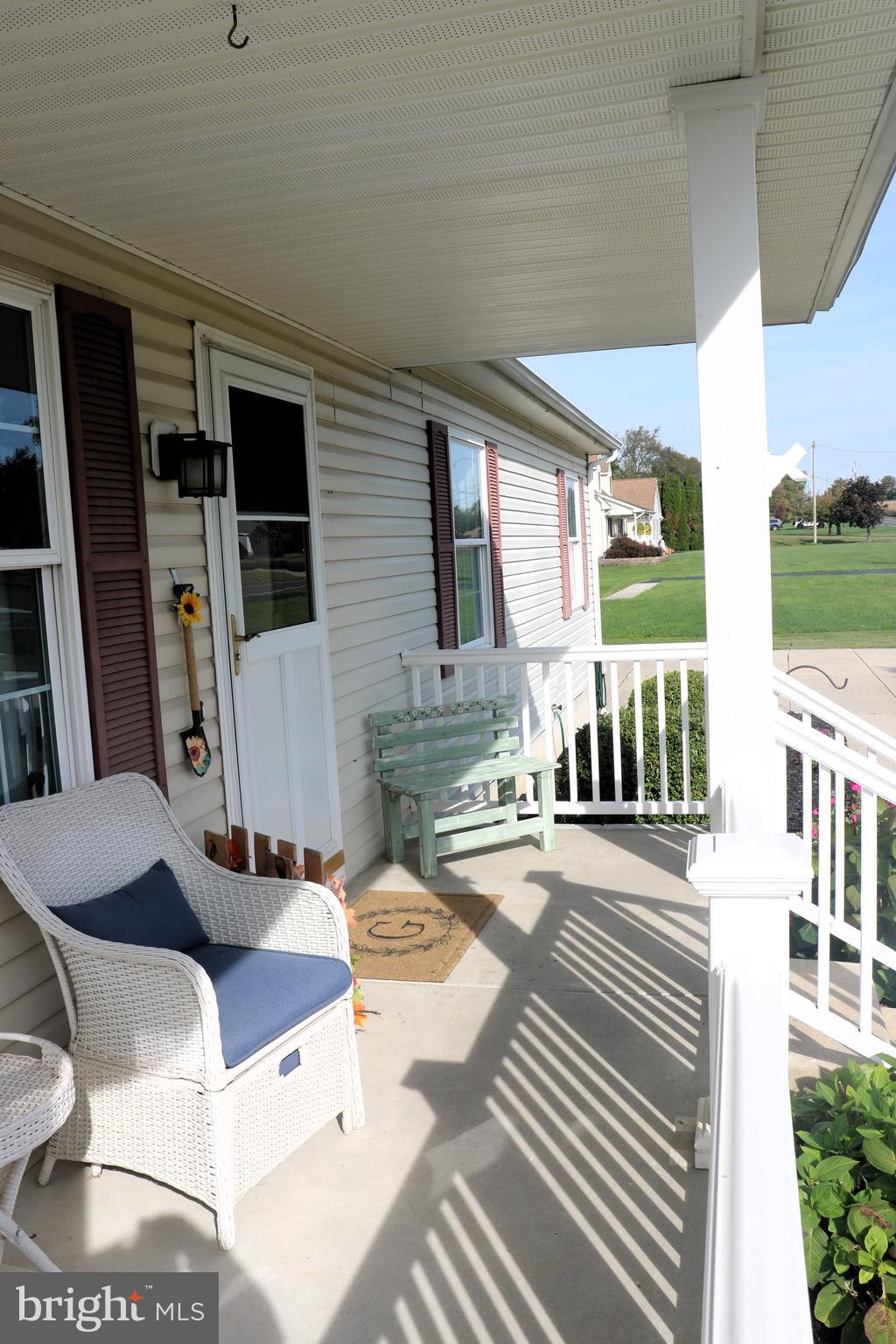 16 Kinkle Road Bridgeton, NJ 08302 - Photo 5 of 31 a living room with furniture a flat screen tv and a table