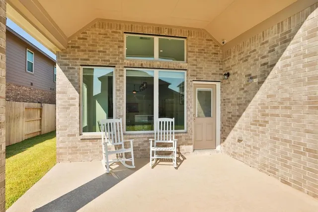 a house with glass door and glass door