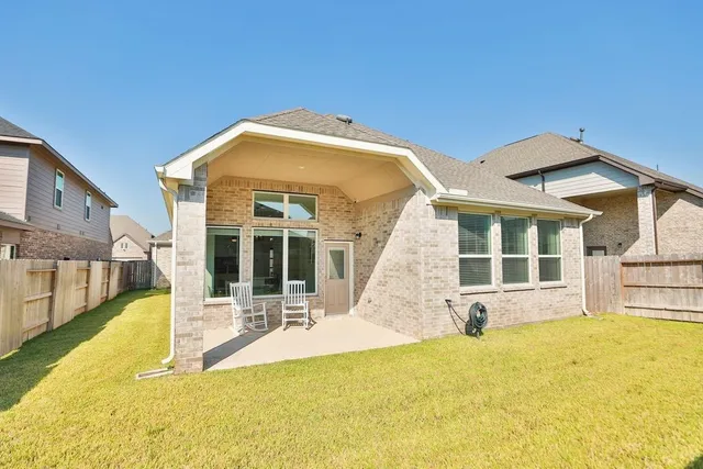 a view of a house with swimming pool