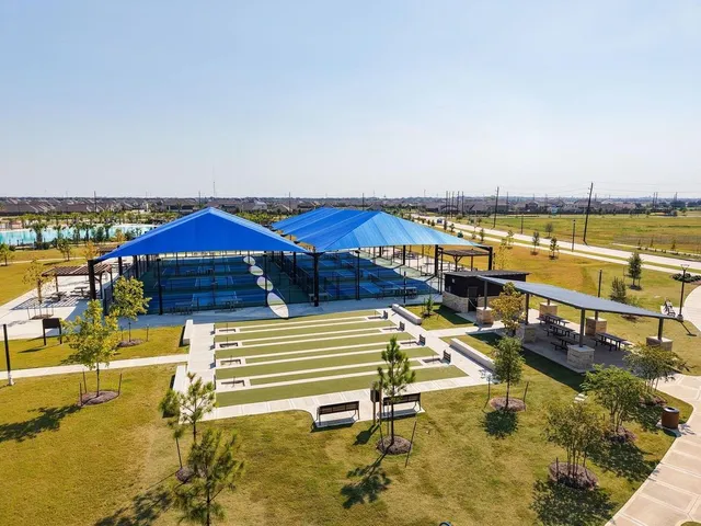 a view of a swimming pool with an ocean view