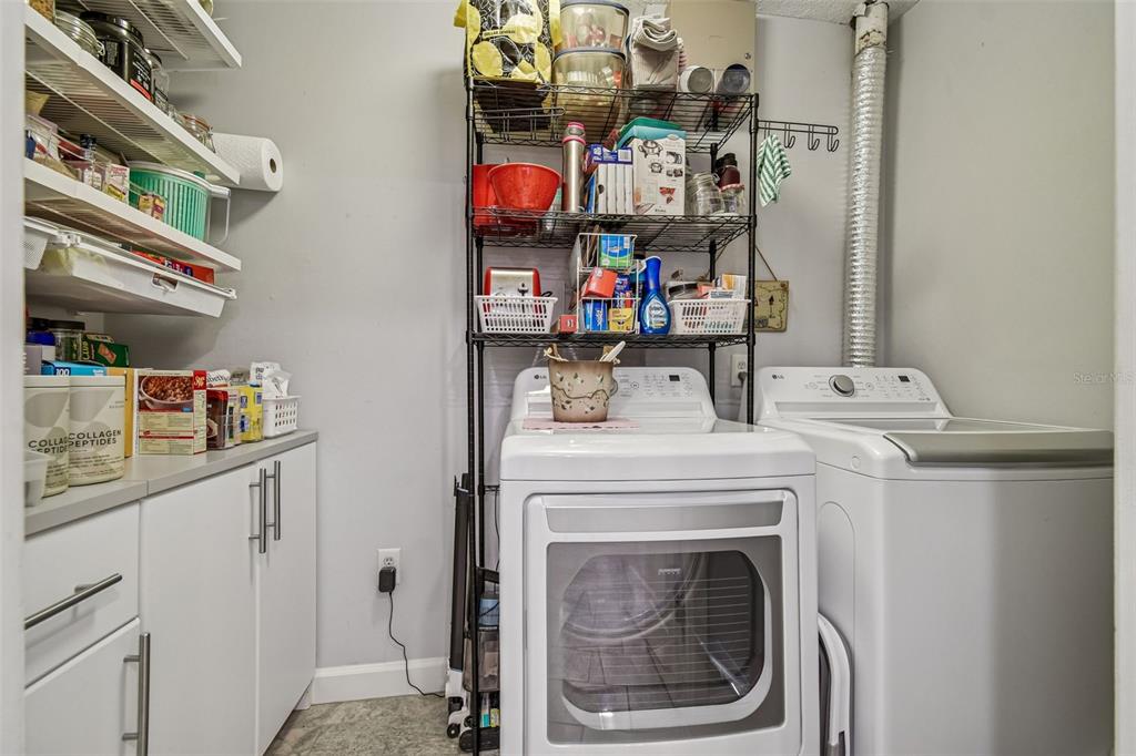 6543 Trail Ridge Drive, Unit 6543 Lakeland, FL 33813 - Photo 15 of 54 a utility room with dryer and washer