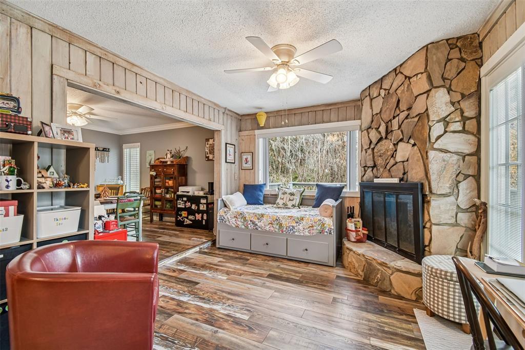 6543 Trail Ridge Drive, Unit 6543 Lakeland, FL 33813 - Photo 20 of 54 a living room with furniture and a flat screen tv