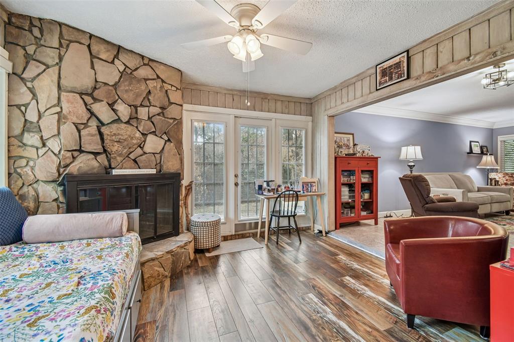 6543 Trail Ridge Drive, Unit 6543 Lakeland, FL 33813 - Photo 21 of 54 a living room with furniture and a wooden floor