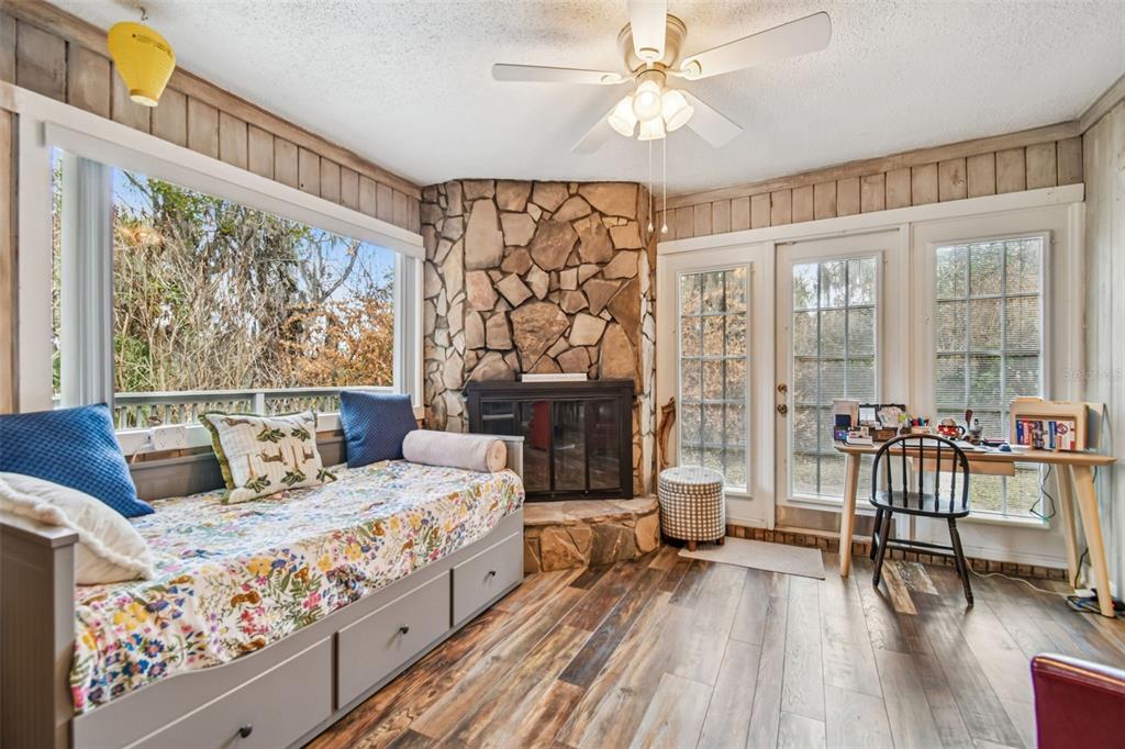 6543 Trail Ridge Drive, Unit 6543 Lakeland, FL 33813 - Photo 22 of 54 a bedroom with a bed and a large window with outer view