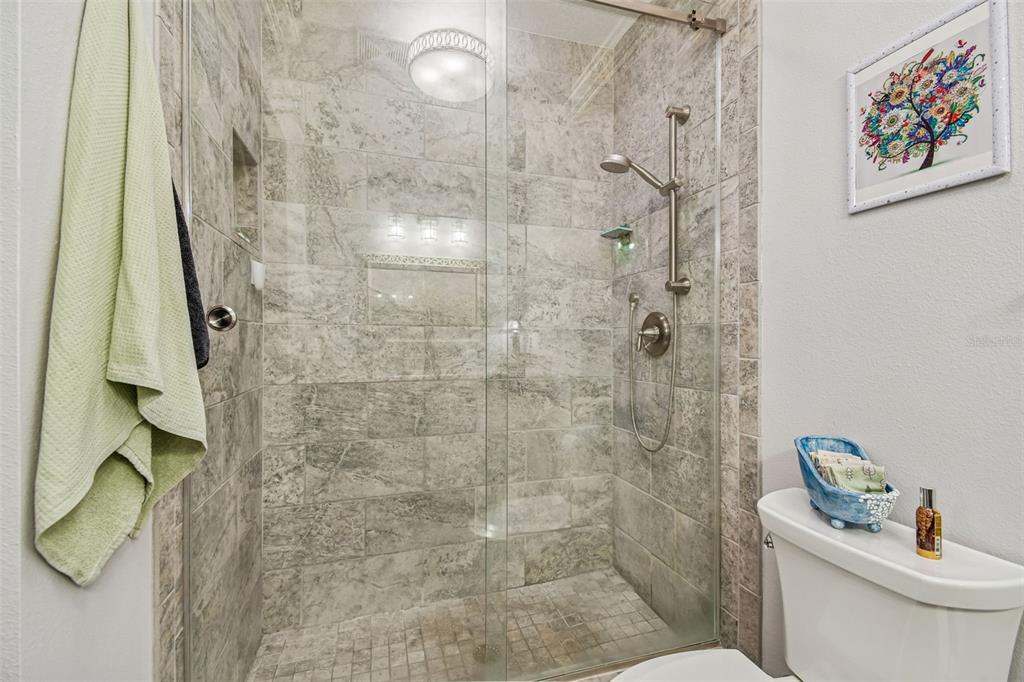 6543 Trail Ridge Drive, Unit 6543 Lakeland, FL 33813 - Photo 34 of 54 a bathroom with a shower toilet and a sink