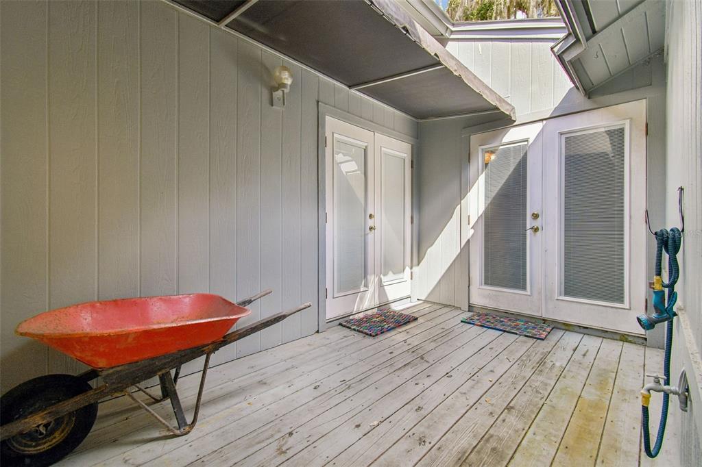 6543 Trail Ridge Drive, Unit 6543 Lakeland, FL 33813 - Photo 43 of 54 a view of a room with wooden floor and furniture