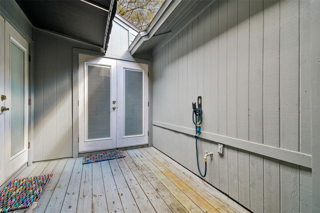 6543 Trail Ridge Drive, Unit 6543 Lakeland, FL 33813 - Photo 45 of 54 a view of a hallway with wooden floor and staircase