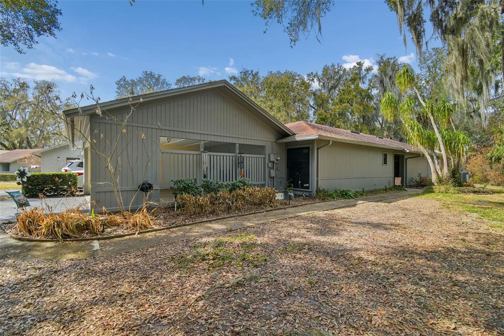 6543 Trail Ridge Drive, Unit 6543 Lakeland, FL 33813 - Photo 46 of 54 a view of a house with backyard and trees