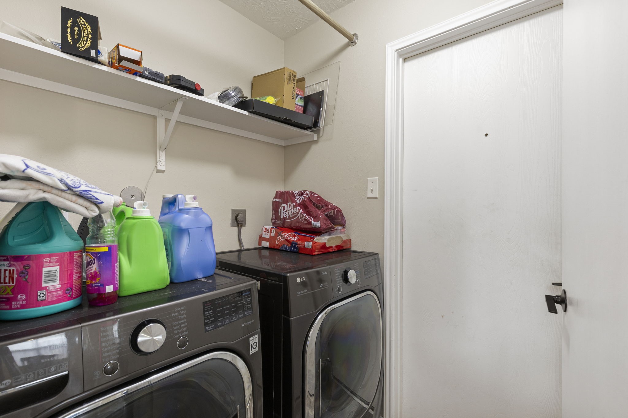 29106 Foxingham Circle Spring, TX 77386 - Photo 16 of 47 a utility room with dryer and washer