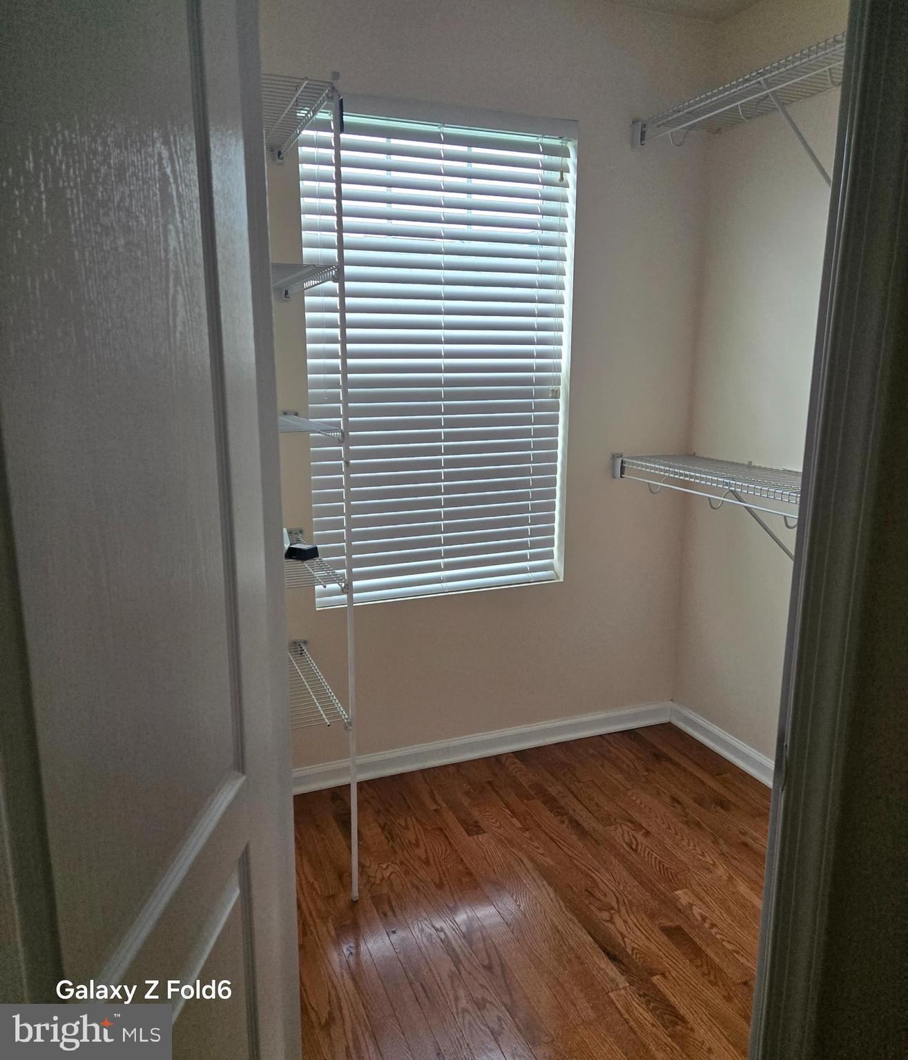 188 Joppa Farm Road Joppa, MD 21085 - Photo 18 of 28 a view of a room with wooden floor and a window