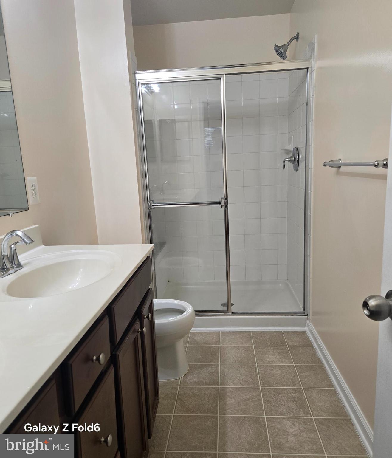 188 Joppa Farm Road Joppa, MD 21085 - Photo 19 of 28 a bathroom with a sink a toilet and shower