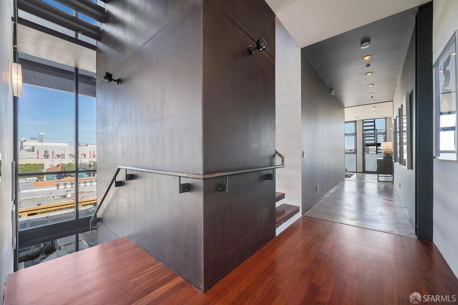 55 Sheridan San Francisco, CA 94103 - Photo 18 of 30 a view of a hallway view with wooden floor and staircase