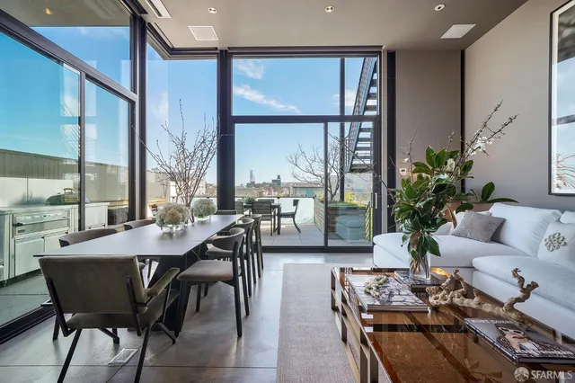 a view of a livingroom with furniture and window