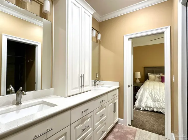 a bathroom with a toilet and a sink